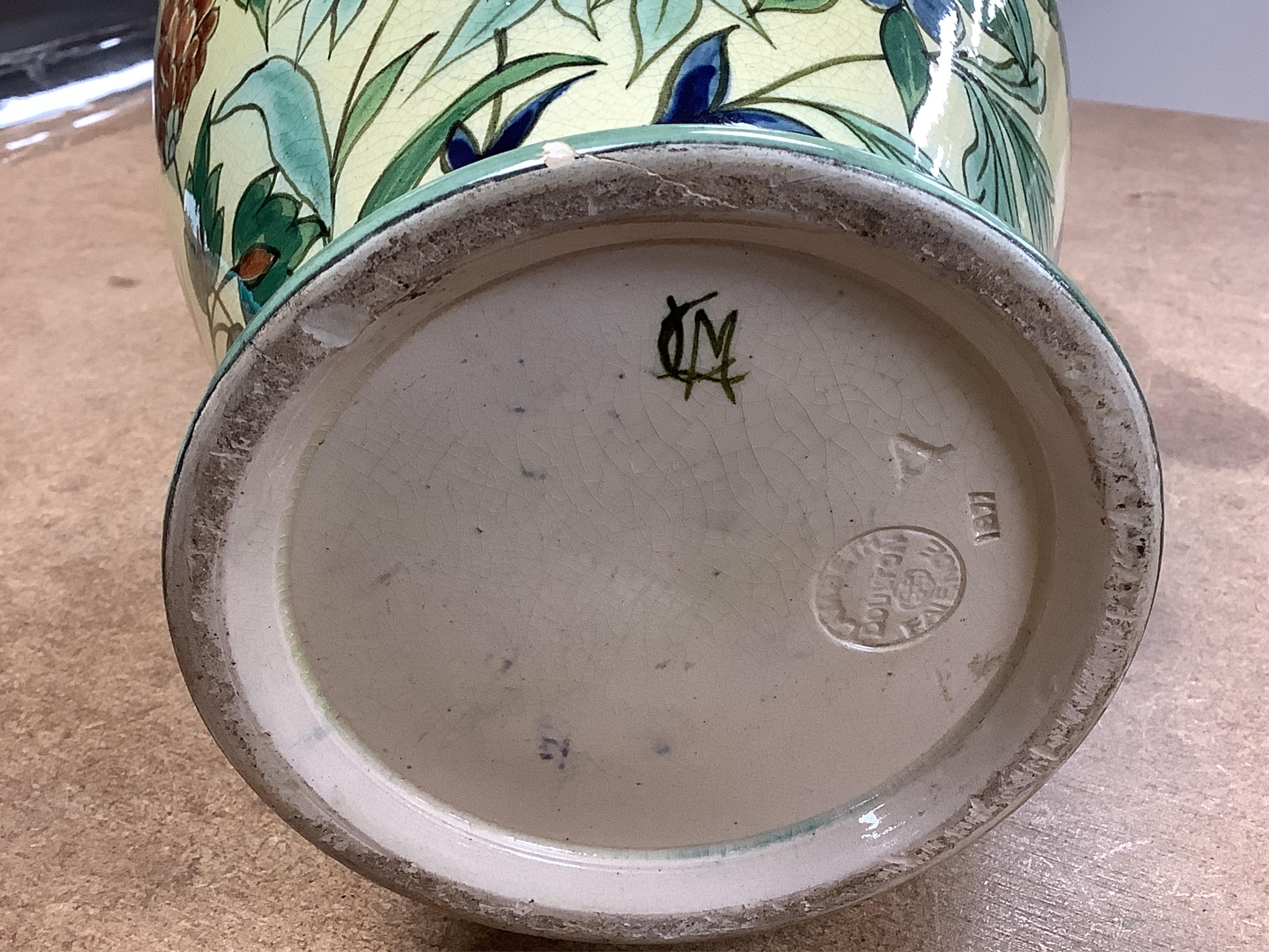 A pair of Doulton Lambeth Persian inspired faience vases, dated 1877, restored, 37cm high